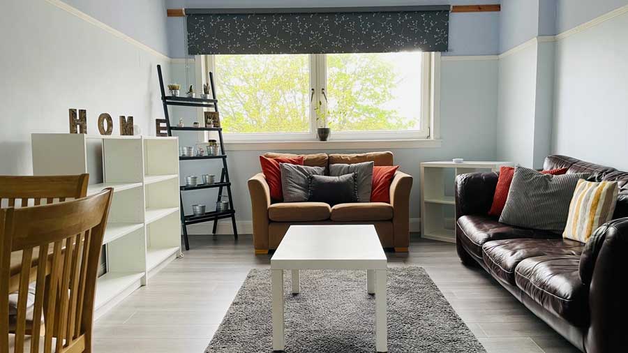 The living room of a home for rent through Homes for Good