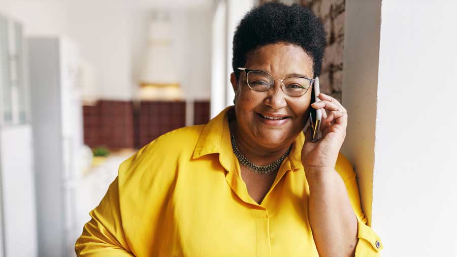 Happy woman talking on the phone