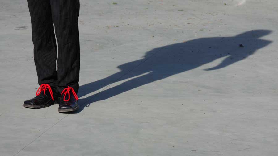A person's shadow on the ground