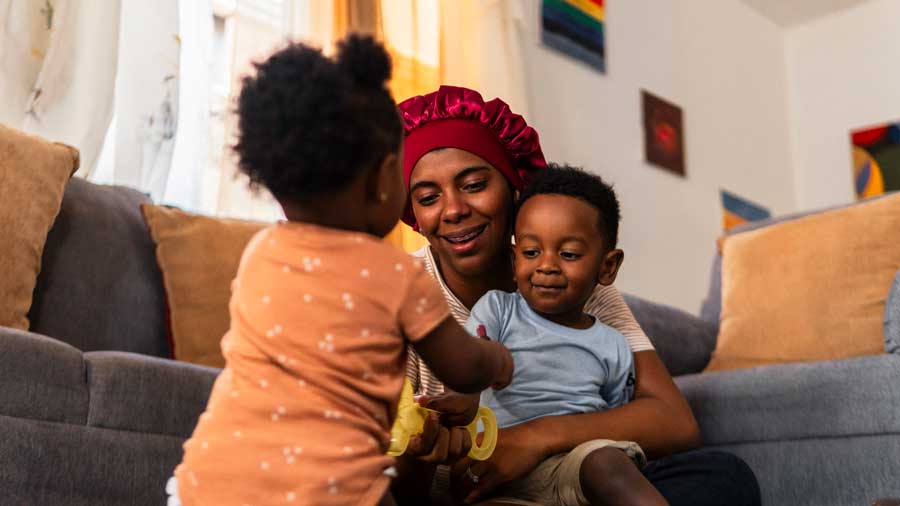A mother and her children at home