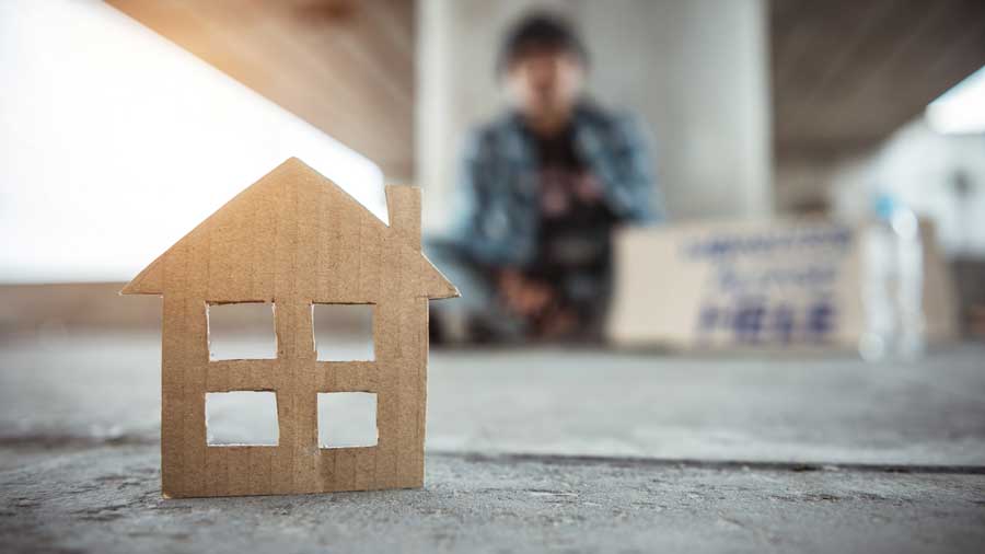 A cardboard cut-out of a house