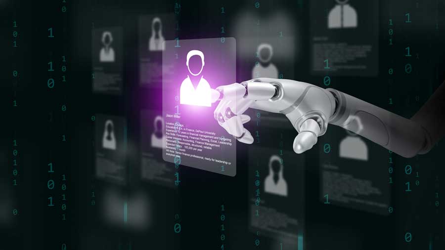 A robot hand analysing a job applicant's data