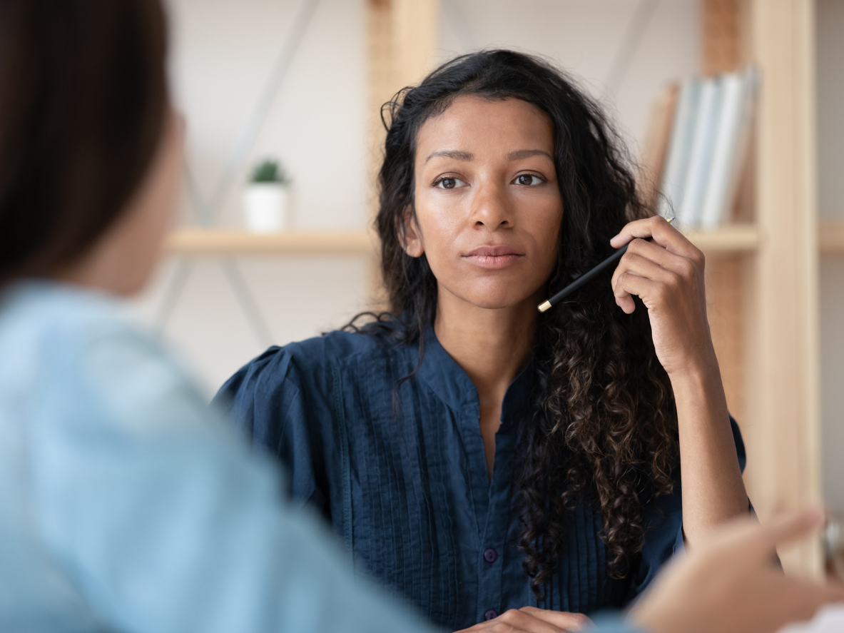 woman talking in a meeting - customer support