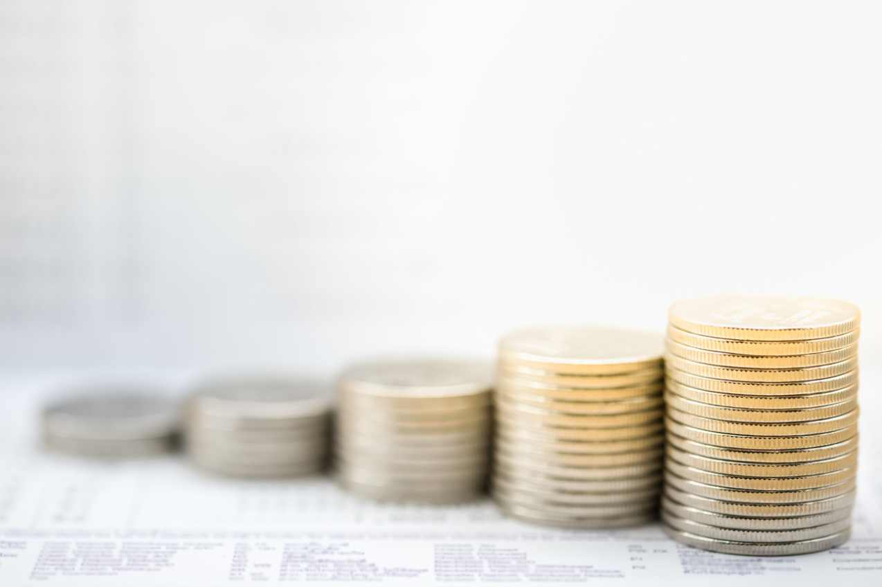 Money, Financial, Business Growth concept. Stack of silver coins on bank account passbook. stock photo